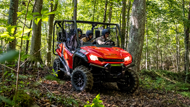 A rider in a Honda SxS