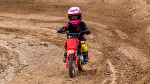 A young rider on a CRF50F