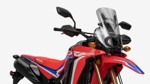 Une vue latérale inclinée d'une moto Honda Dual Sport